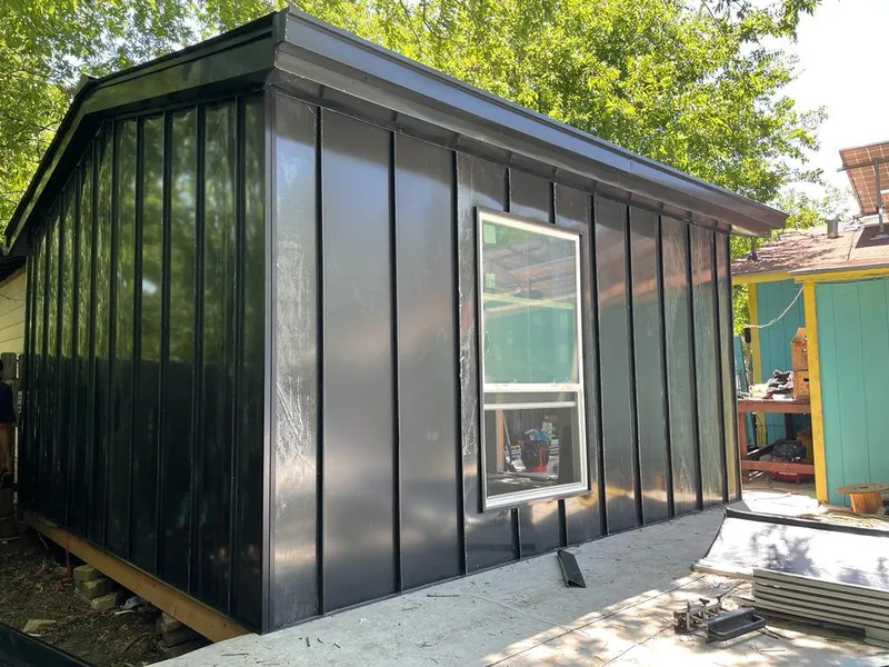 Black standing seam metal wall panels for Roof Inspection in Selah